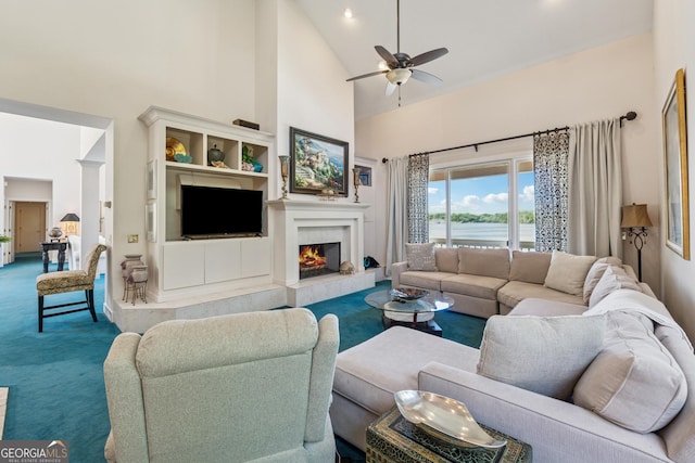 2917 Pointe Dr, Gainesville, GA 30506 - living room featuring high vaulted ceiling, carpet floors, ceiling fan, and a fireplace