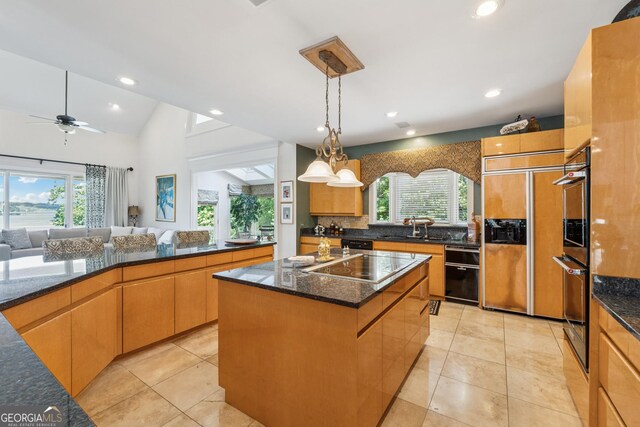 2917 Pointe Dr, Gainesville, GA 30506 - kitchen featuring black appliances, healthy amount of natural light, backsplash, a kitchen island, and recessed lighting