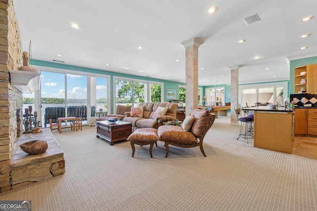 2917 Pointe Dr, Gainesville, GA 30506 - living room featuring decorative columns, light carpet, and recessed lighting