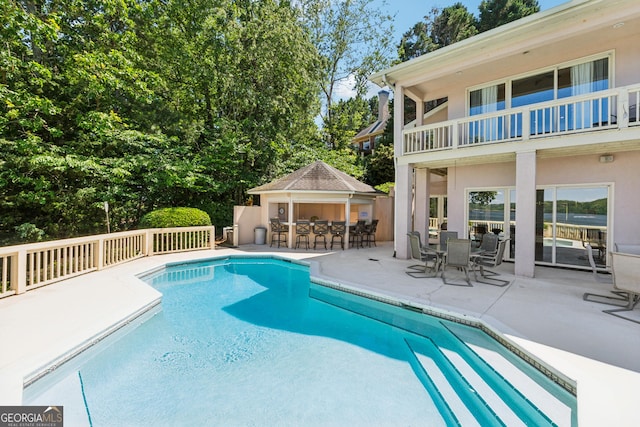 2917 Pointe Dr, Gainesville, GA 30506 - view of pool featuring a patio area and view of wooded area