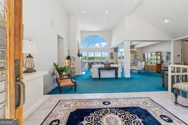 2917 Pointe Dr, Gainesville, GA 30506 - carpeted entrance foyer featuring a high ceiling, decorative columns, a chandelier, healthy amount of natural light, and recessed lighting