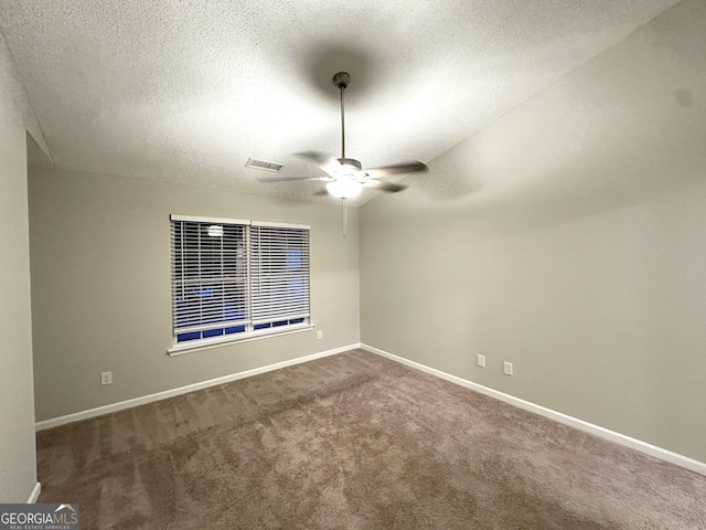 408 Kendall Ln, Mcdonough, GA 30253 - empty room with carpet floors, ceiling fan, baseboards, and a textured ceiling