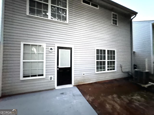 408 Kendall Ln, Mcdonough, GA 30253 - rear view of property featuring a patio area and central AC