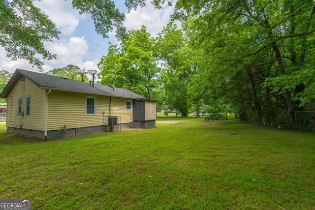 525 Baker Cir NW, Atlanta, GA 30318 - view of grassy yard featuring cooling unit