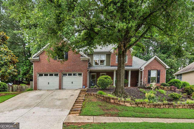 107 W Point Trl, Woodstock, GA 30189 - view of front of house featuring driveway, brick siding, and an attached garage