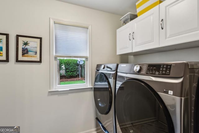 107 W Point Trl, Woodstock, GA 30189 - washroom featuring cabinet space, washer and clothes dryer, and baseboards