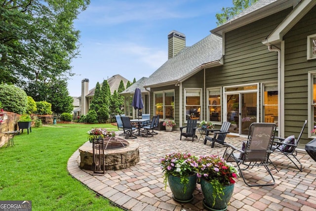 107 W Point Trl, Woodstock, GA 30189 - view of patio with an outdoor fire pit