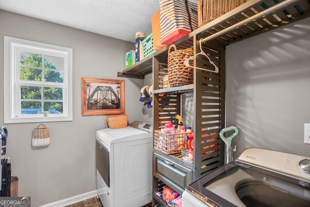 81 Maple Creek Dr, Newnan, GA 30263 - laundry area with washer and clothes dryer and baseboards