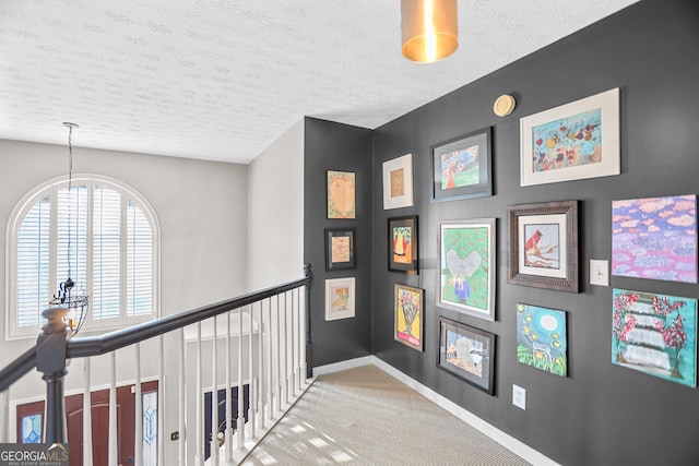 81 Maple Creek Dr, Newnan, GA 30263 - corridor with carpet floors, baseboards, and a textured ceiling