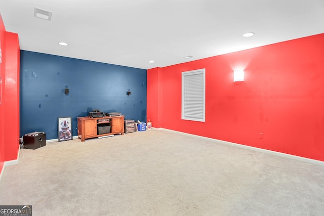 81 Maple Creek Dr, Newnan, GA 30263 - unfurnished living room featuring carpet flooring, baseboards, and recessed lighting