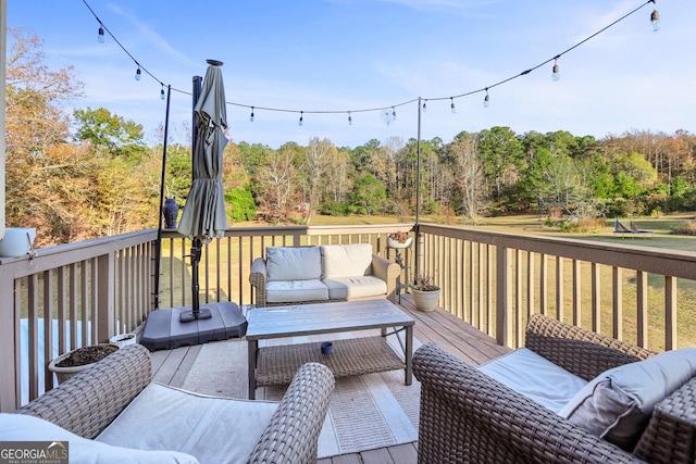 81 Maple Creek Dr, Newnan, GA 30263 - wooden terrace featuring outdoor lounge area and a forest view