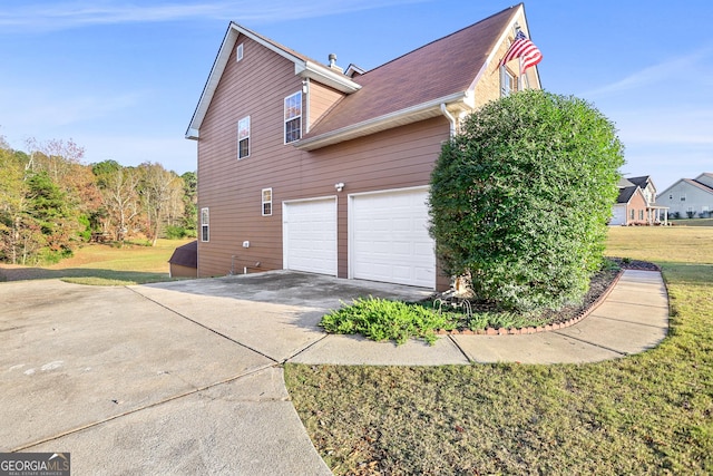 81 Maple Creek Dr, Newnan, GA 30263 - view of property exterior with concrete driveway, a yard, and a garage