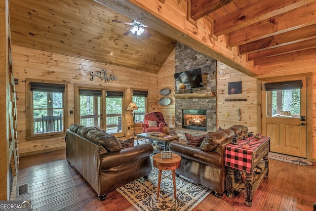 1061 Fir Ln, Ellijay, GA 30540 - living area with wood walls, hardwood / wood-style flooring, a ceiling fan, a fireplace, and wooden ceiling