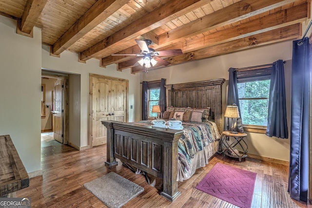 1061 Fir Ln, Ellijay, GA 30540 - bedroom with wood ceiling with exposed beams, baseboards, hardwood / wood-style floors, and a ceiling fan