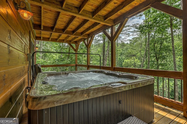 1061 Fir Ln, Ellijay, GA 30540 - wooden terrace with a hot tub and a wooded view