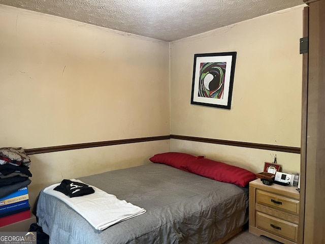 8636 Woodside Ln, Jonesboro, GA 30238 - bedroom with a textured ceiling