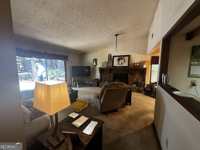 8636 Woodside Ln, Jonesboro, GA 30238 - carpeted living room with a textured ceiling and a stone fireplace