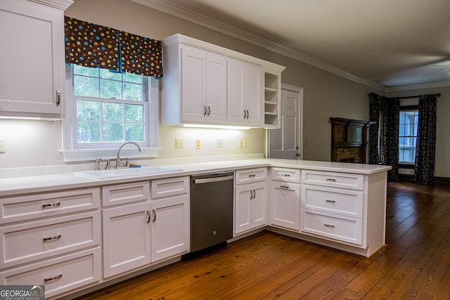 15 Westover Dr SW, Rome, GA 30165 - kitchen with stainless steel dishwasher, a sink, a peninsula, white cabinets, and dark wood finished floors