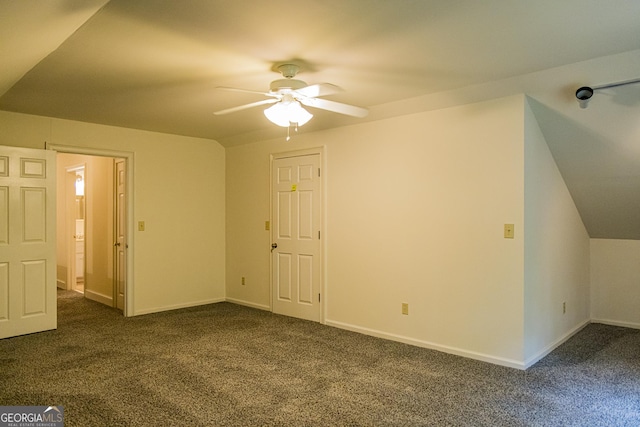 15 Westover Dr SW, Rome, GA 30165 - additional living space with a ceiling fan, dark colored carpet, and baseboards