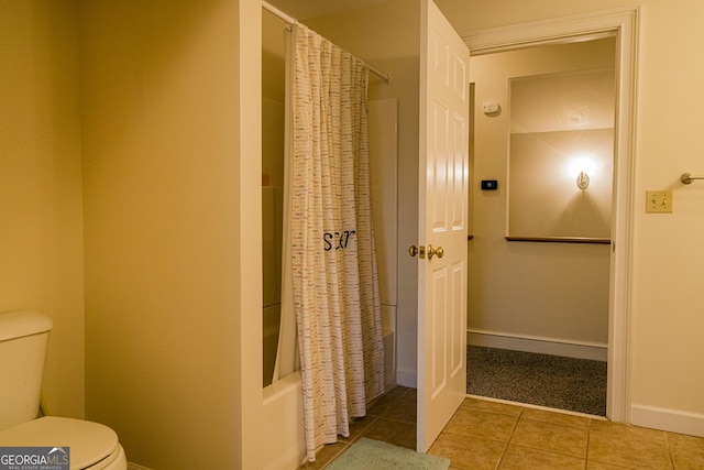 15 Westover Dr SW, Rome, GA 30165 - bathroom featuring tile patterned flooring, shower / bathtub combination with curtain, toilet, and baseboards