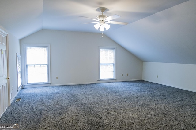 15 Westover Dr SW, Rome, GA 30165 - additional living space with lofted ceiling, ceiling fan, carpet floors, healthy amount of natural light, and baseboards
