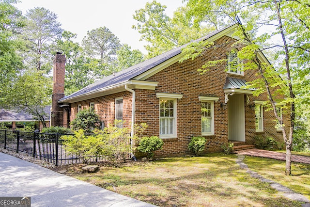 15 Westover Dr SW, Rome, GA 30165 - view of front of property with brick siding, a chimney, and a standing seam roof