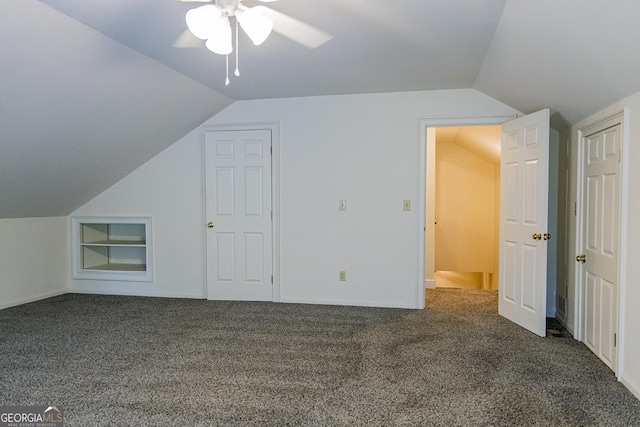 15 Westover Dr SW, Rome, GA 30165 - additional living space with vaulted ceiling, dark colored carpet, and ceiling fan