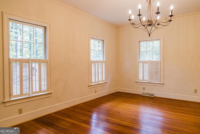 15 Westover Dr SW, Rome, GA 30165 - spare room with a chandelier, hardwood / wood-style floors, baseboards, and ornamental molding
