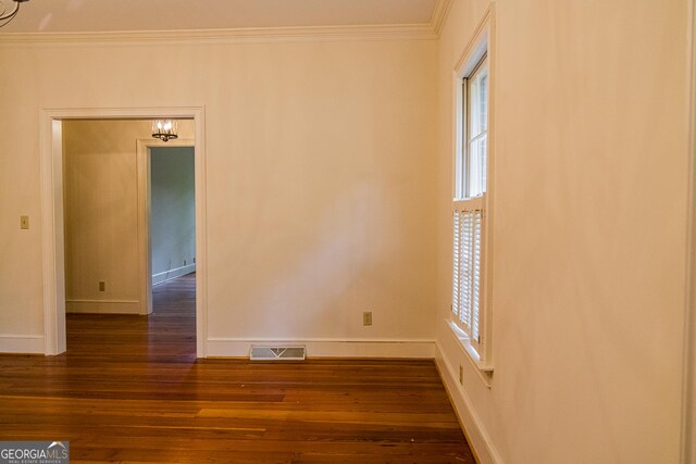 15 Westover Dr SW, Rome, GA 30165 - unfurnished room featuring ornamental molding, dark wood finished floors, and baseboards