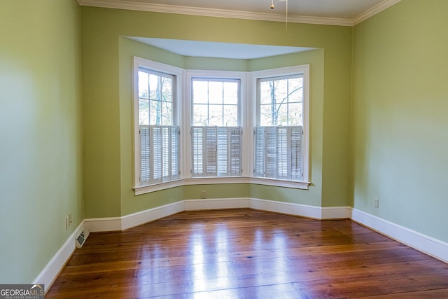 15 Westover Dr SW, Rome, GA 30165 - spare room featuring plenty of natural light, hardwood / wood-style floors, ornamental molding, and baseboards
