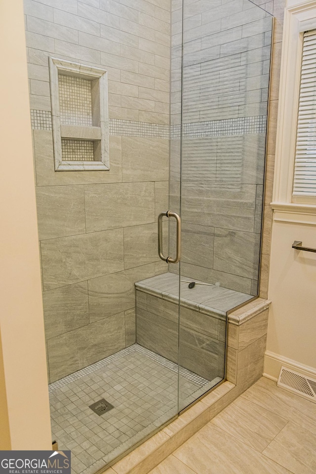 15 Westover Dr SW, Rome, GA 30165 - full bathroom featuring a stall shower, baseboards, and tile patterned flooring