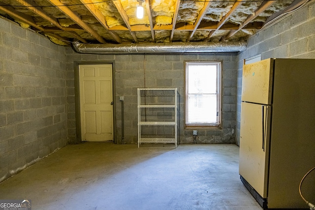 15 Westover Dr SW, Rome, GA 30165 - below grade area featuring freestanding refrigerator and concrete block wall