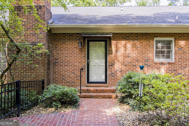 15 Westover Dr SW, Rome, GA 30165 - view of exterior entry featuring roof with shingles and brick siding