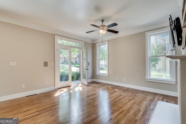 3641 Ridge Towne Dr, Duluth, GA 30096 - empty room featuring ornamental molding, ceiling fan, and wood finished floors