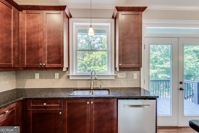 3641 Ridge Towne Dr, Duluth, GA 30096 - kitchen with stainless steel dishwasher, ornamental molding, tasteful backsplash, dark stone countertops, and french doors