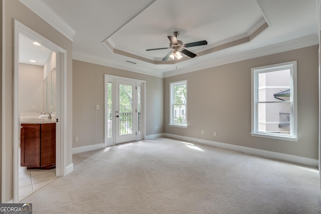 3641 Ridge Towne Dr, Duluth, GA 30096 - empty room with a raised ceiling, light carpet, crown molding, and ceiling fan