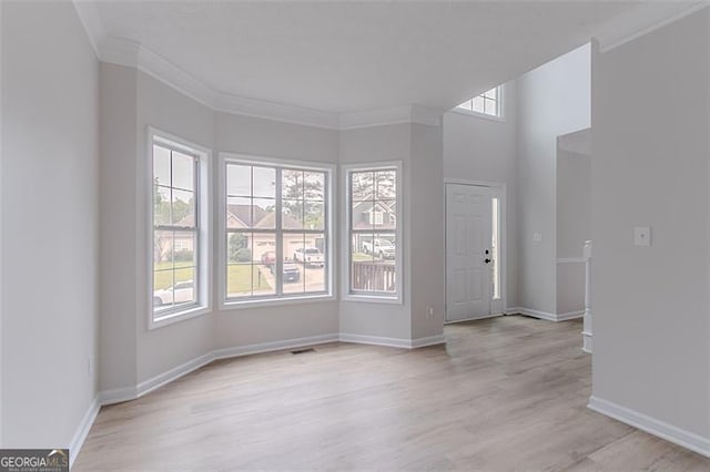 1706 Brandon Lee Way, Marietta, GA 30008 - entrance foyer with crown molding, light wood-style flooring, and baseboards