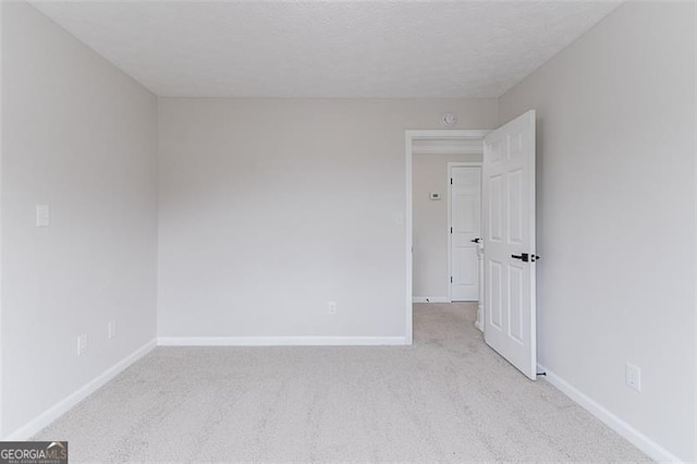 1706 Brandon Lee Way, Marietta, GA 30008 - spare room featuring light colored carpet and baseboards