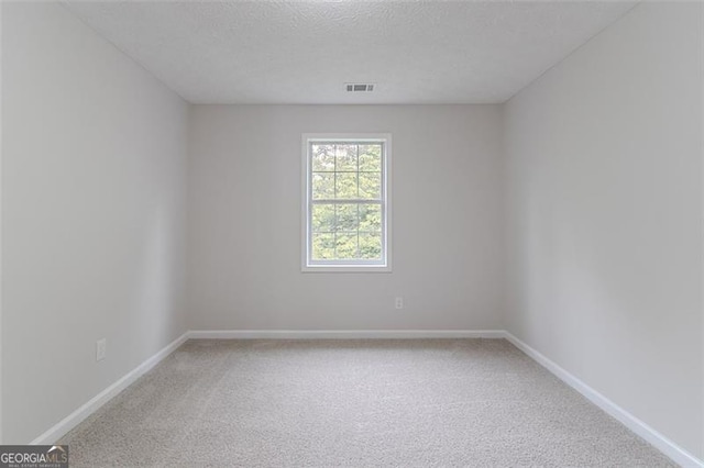 1706 Brandon Lee Way, Marietta, GA 30008 - unfurnished room with carpet floors, a textured ceiling, and baseboards