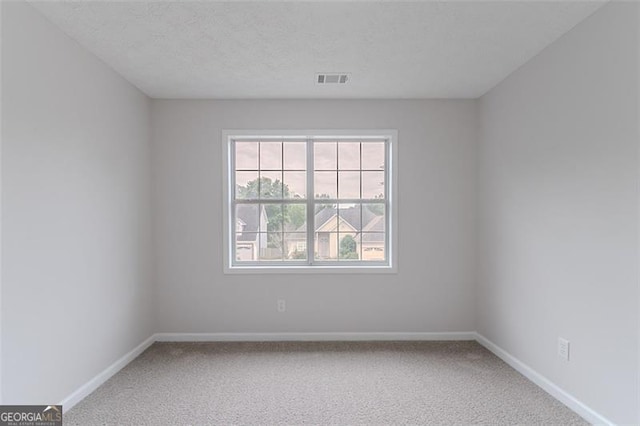 1706 Brandon Lee Way, Marietta, GA 30008 - carpeted empty room with baseboards and a textured ceiling