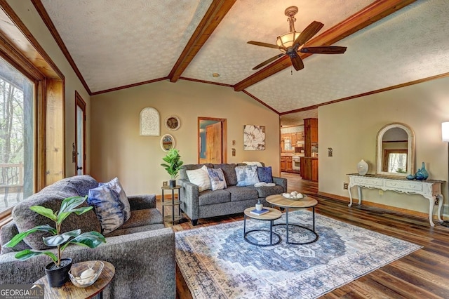 3452 Monica Ln SW, Conyers, GA 30094 - living area with wood finished floors, a ceiling fan, baseboards, and a textured ceiling