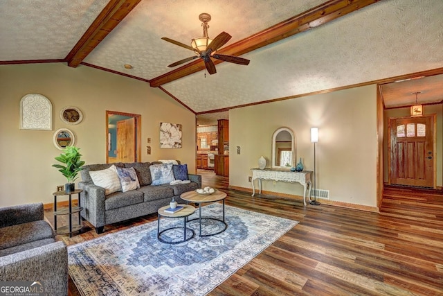 3452 Monica Ln SW, Conyers, GA 30094 - living area with wood finished floors, baseboards, a ceiling fan, crown molding, and a textured ceiling