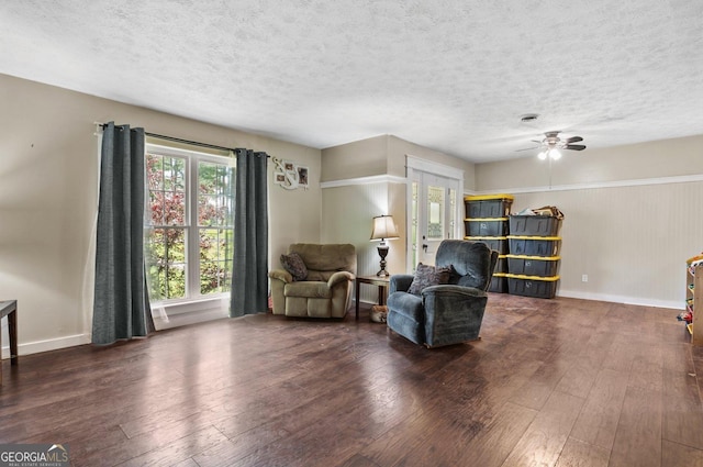 1 Donley Dr NW, Rome, GA 30165 - living area featuring hardwood / wood-style flooring, a textured ceiling, a ceiling fan, and baseboards