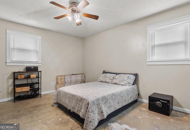 1 Donley Dr NW, Rome, GA 30165 - bedroom featuring concrete floors, baseboards, and a ceiling fan