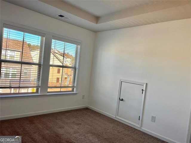 3677 Hidden Valley Cir, Lawrenceville, GA 30044 - carpeted spare room featuring baseboards and a tray ceiling