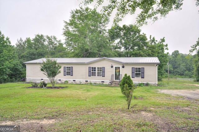 4040 US Highway 25 N, Hephzibah, GA 30815 - manufactured / mobile home with crawl space, a front yard, and metal roof