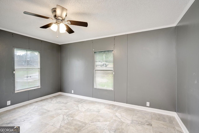 4040 US Highway 25 N, Hephzibah, GA 30815 - spare room with crown molding, ceiling fan, a textured ceiling, and baseboards