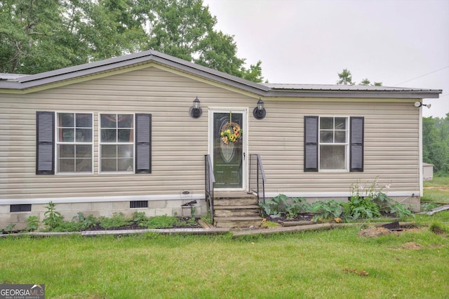 4040 US Highway 25 N, Hephzibah, GA 30815 - view of front of home with crawl space, a front yard, and entry steps