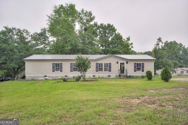 4040 US Highway 25 N, Hephzibah, GA 30815 - manufactured / mobile home featuring crawl space, a front lawn, metal roof, and entry steps