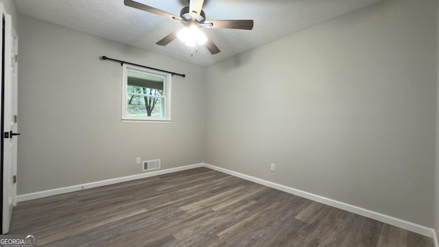 253 Yonah Valley Rd, Cleveland, GA 30528 - spare room featuring dark wood-type flooring, baseboards, and ceiling fan